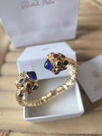Bracciale rigido in stile bizantino placcato oro 24k di Rachele Falvo con quarziti blu e topazi colorati