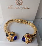 Bracciale rigido in stile bizantino placcato oro 24k di Rachele Falvo con quarziti blu e topazi colorati