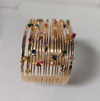 Bracciale stile schiava in oro su bronzo con topazi e quarziti naturali multicolor, regolabile