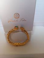 Bracciale etrusco a molla in bronzo con oro opaco e topazi azzurri naturali