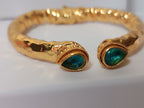 Bracciale etrusco a molla in bronzo con oro opaco e topazi azzurri naturali