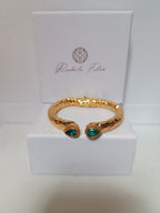 Bracciale etrusco a molla in bronzo con oro opaco e topazi azzurri naturali