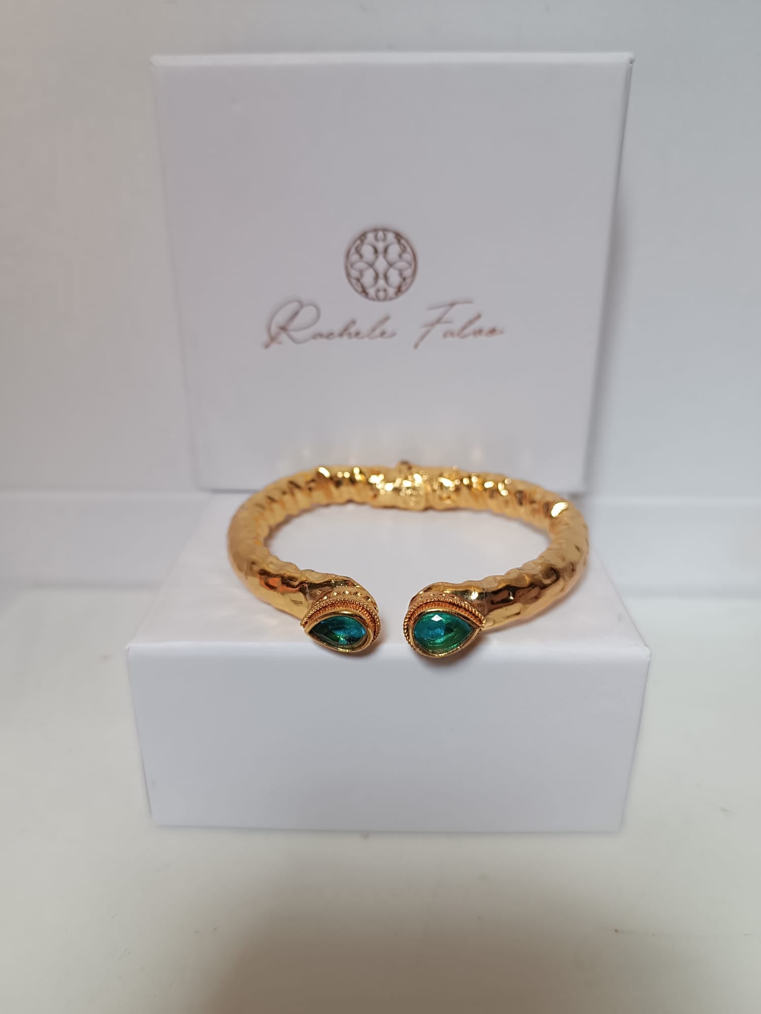 Bracciale etrusco a molla in bronzo con oro opaco e topazi azzurri naturali
