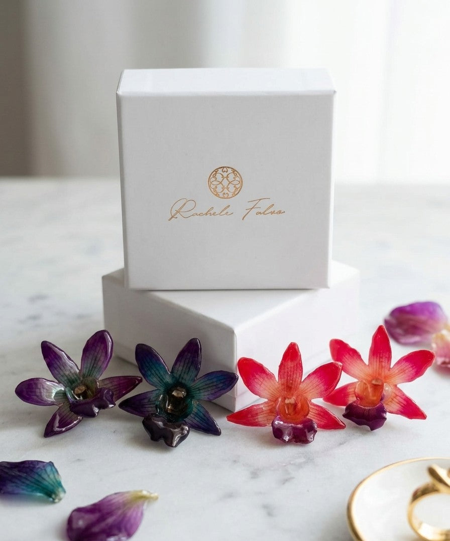 orecchini orchidee naturali in resina eleganti varianti disponibili rosa o viola