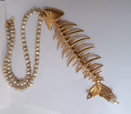 Collana lunga in perle naturali con centrale lisca di pesce