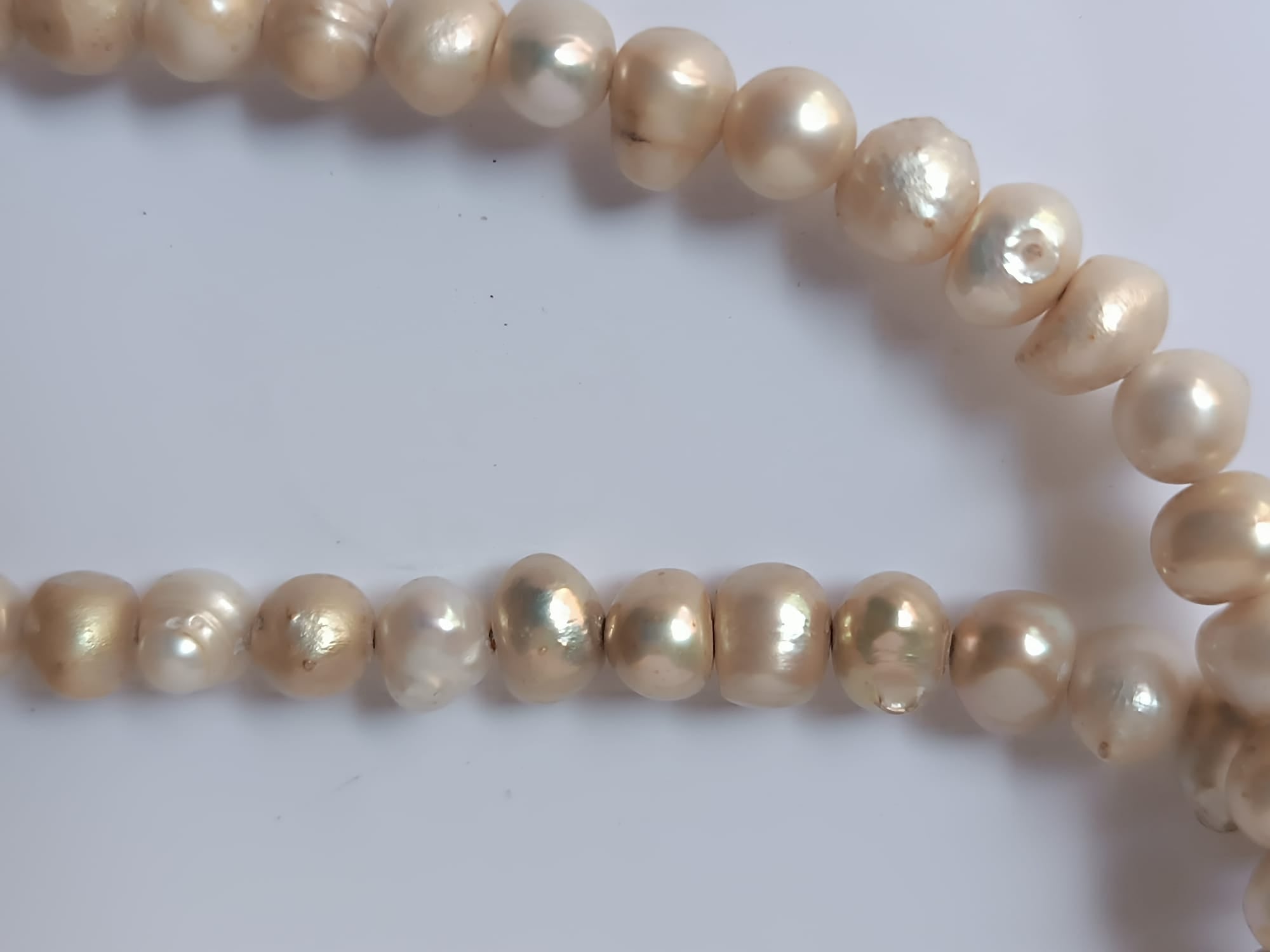 Collana lunga in perle naturali con centrale lisca di pesce