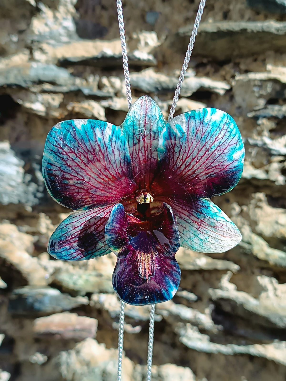 collana orchidea rara ghiaccio riflessi viola resina saliscendi argento galvanizzato  regolabile elegante