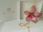 Collana artigianale saliscendi con vera Plumeria  in resina