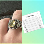 Anello artigianale in argento con ambra baltica giallo miele taglio cabochon