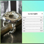 Anello scultoreo in argento fuso e resina artistica con druze di quarzo bianco naturale fatto a mano