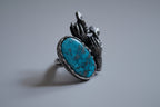 Anello artistico in argento con due visi di donna e turchese naturale da 12 carati