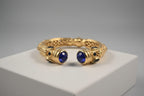 Bracciale in oro su bronzo con topazi azzurri naturali e apertura a molla