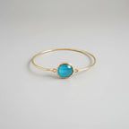 Bracciale in oro opaco su bronzo con occhio di gatto azzurro naturale sfaccettato