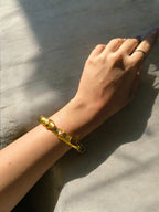 Bracciale serpente in oro galvanico su bronzo con tormaline rosa naturali
