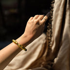 Bracciale serpente in oro galvanico su bronzo con tormaline rosa naturali