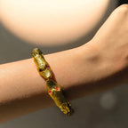 Bracciale serpente in oro galvanico su bronzo con tormaline rosa naturali