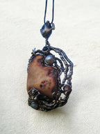 “Collana in argento 925 con sirena, stelle marine e ambra grigia naturale”
