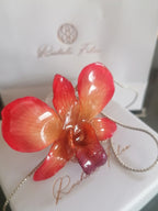collana orchidea arancio naturale resina saliscendi argento regolabile elegante