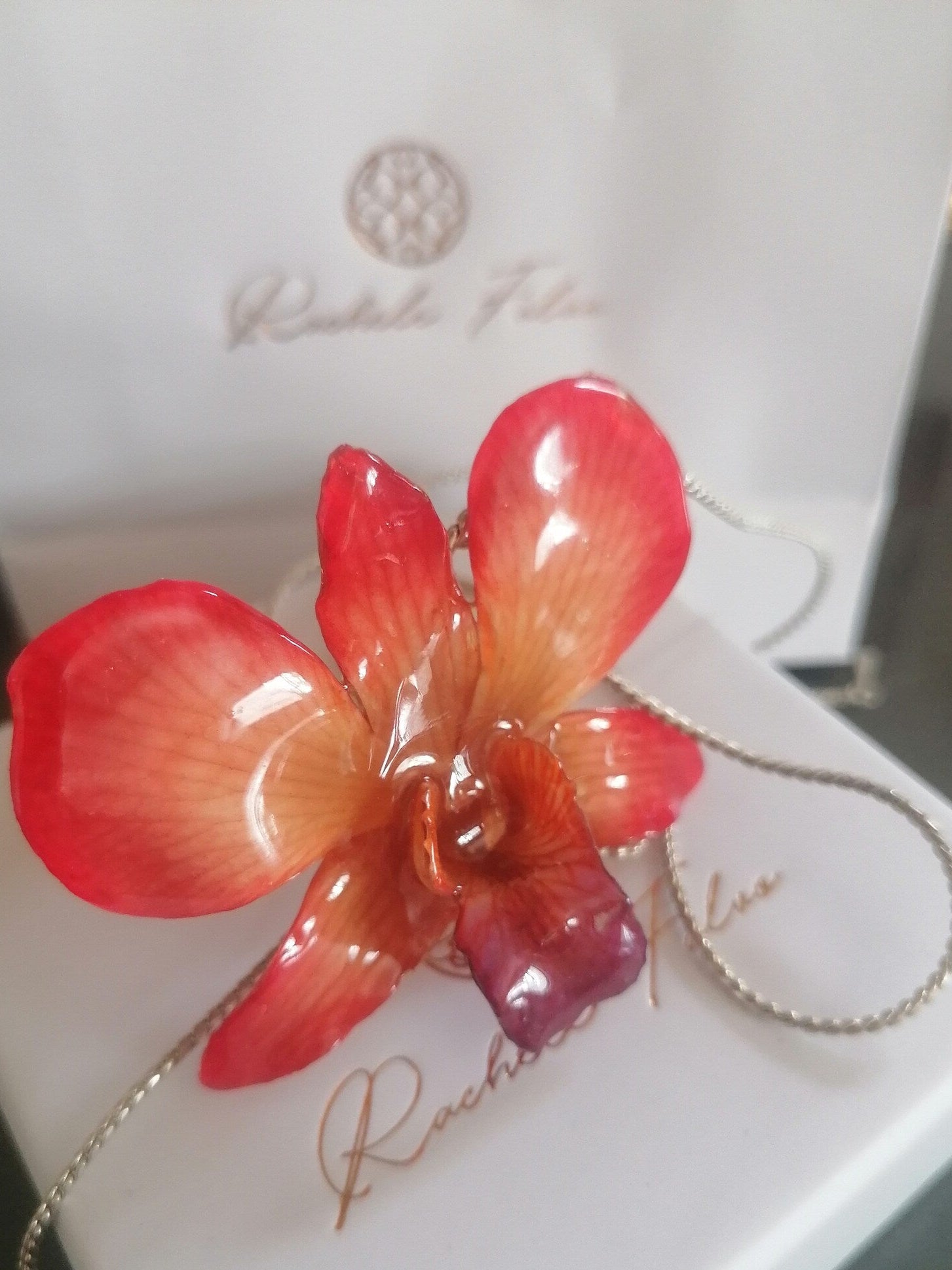 collana orchidea arancio naturale resina saliscendi argento regolabile elegante