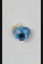 collana orchidea azzurra resina saliscendi oro galvanizzato regolabile elegante