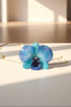 collana orchidea azzurra resina saliscendi oro galvanizzato regolabile elegante
