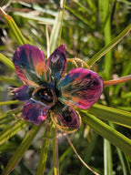 “Collana con orchidea Dendrobium metallic colors inglobata in resina”