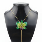 collana orchidea dendrobium verde bocca viola resina saliscendi oro argento regolabile elegante