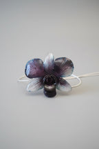 collana orchidea rara ghiaccio riflessi viola resina saliscendi argento regolabile elegante