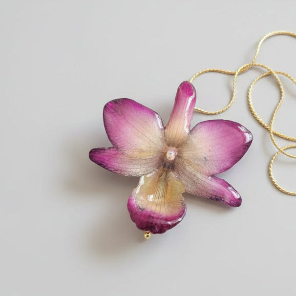 collana orchidea ibrida viola panna in resina elegante