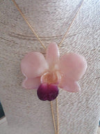 collana orchidea stellata bianca riflessi rosa resina saliscendi regolabile elegante
