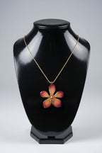 collana orchidea vanda arancio marrone resina catenina oro galvanico elegante