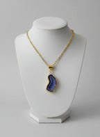 “Collana elegante con agata blu geode centrale”