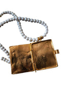 Collana artigianale Made in Italy con libro sacro, Cristo in rilievo e pietre turchesi naturali