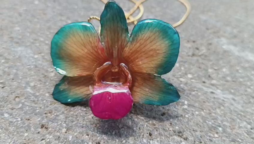 collana orchidea vera arancio azzurra stabilizzata resina