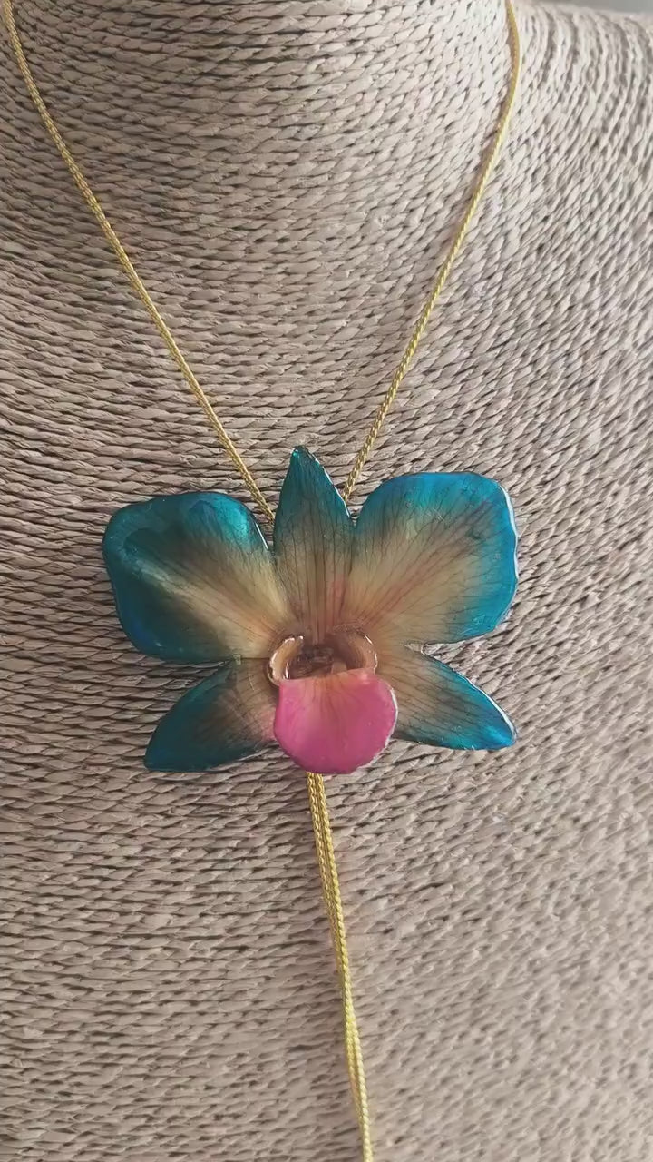 collana orchidea vera arancio azzurra stabilizzata resina