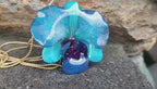 collana orchidea azzurra resina saliscendi oro galvanizzato regolabile elegante