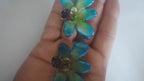 Orecchini con orchidee naturali inglobate in resina con ganci in argento leggeri ed eleganti